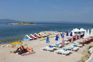 Apartments with parking spaces Novi Vinodolski - 24265