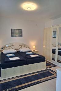 Apartments with parking spaces Novi Vinodolski - 24265