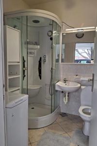 Apartments with parking spaces Novi Vinodolski - 24265