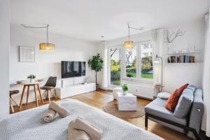 TRABER APARTMENTS Studio Kaffee Terrasse & Parken