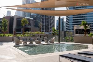 Relax in Style with Outdoor Pool and Burj Khalifa Views Nearby