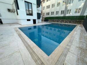 Paradise Garden sitesi 3 oda havuzlu eşyalı daire kişi fiyatı değil oda fiyatı