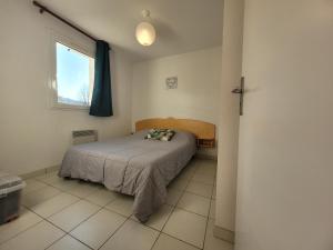 Appartements La Maison Bleue, village vacances, piscine, parking : photos des chambres