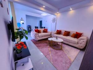 spacious elegant two bedroom apartment with swimming pool, private parking space, children playground ,gym and beatable city views