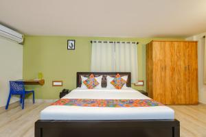 FabHotel La Palma Suites - Nr RMZ Eco world
