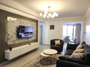 celestial modernly furnished two bedroom apartment with amazing city views heated swimming pool ,children playground ,ample private parking space and rooftop chill spot