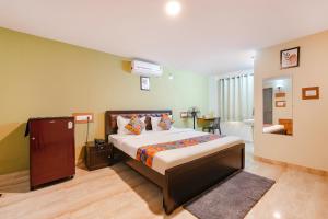 FabHotel La Palma Suites - Nr RMZ Eco world