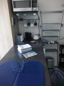 Appartements Pied a terre, sejour idyllique face a la mer classe 2 etoiles : photos des chambres