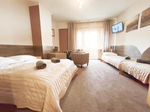 Pokoje Gościnne i Apartamenty Krupówki 19