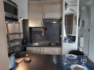 Appartements Pied a terre, sejour idyllique face a la mer classe 2 etoiles : photos des chambres