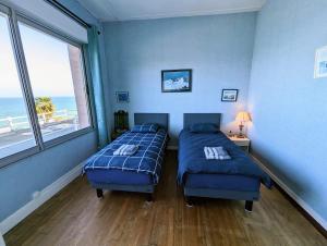 Appartements La corniche- vue panoramique sur mer : photos des chambres