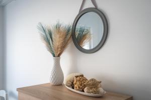 HostWise – Seaside Escape with Balcony