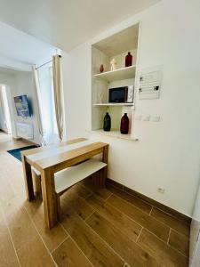 Appartements Studio neuf 50m2 dans le centre : photos des chambres