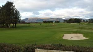 Comfortable home by the Golf links and Sea