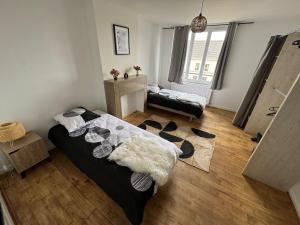 Appartements Appartement l-echo des remparts : photos des chambres