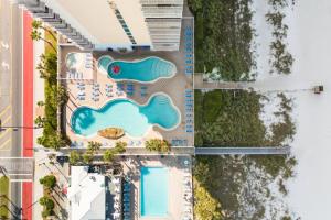 Spacious Gulf-Front Condo w Resort AmenitiesSweeping Ocean Views