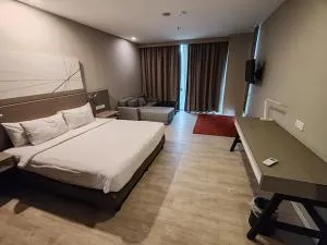 Flash Q hotel rooms - 达曼萨拉佩尔达纳