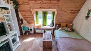 APARTAMENT GOŚCINNY "DOMEK NA DRZEWIE"