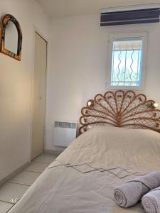 Appartements Le Murier - Rez de jardin avec veranda, terrasse a 5min a pied de la mer avec parking - BY AURAconciergerie : photos des chambres
