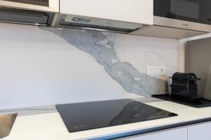 BMGA l Poppys Home Attic Vaticano