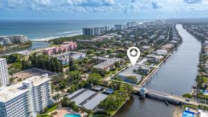 Waterfront Oasis 2BR 2BA with Pool, Gym, Balcony & Parking