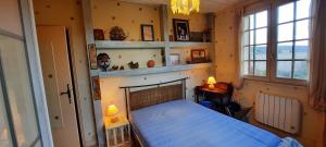 Maisons de vacances Maison avec piscine et jardin d-arbres fruitiers : photos des chambres