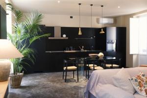 Palazzo Valguarnera - Suites & Luxury Apartments