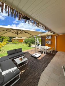 Hana Mana Bungalow - Magnifique Piscine, Plage à 100m - 3hvězdičkové hotely ve městě Grand-Bourg