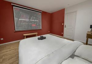 Appartements T2 Lumineux N1 avec Jacuzzi & Video : photos des chambres