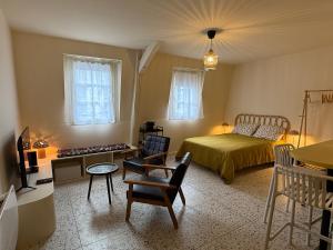 Appartements Duplex avec patio - Quartier historique : photos des chambres
