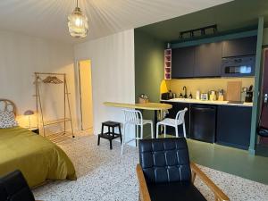 Appartements Duplex avec patio - Quartier historique : photos des chambres