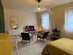 Appartements Duplex avec patio - Quartier historique : photos des chambres