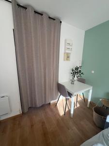 Appartements Le Discret : photos des chambres