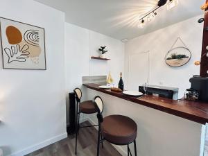 Appartements Chez Cath Studio neuf cosy proche centre-ville : photos des chambres