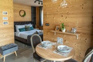 Appartements Boutique Hotel - Notre Chalet : photos des chambres