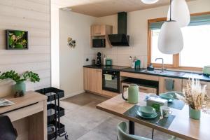 Appartements Boutique Hotel - Notre Chalet : photos des chambres