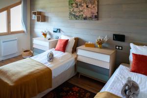 Appartements Boutique Hotel - Notre Chalet : photos des chambres