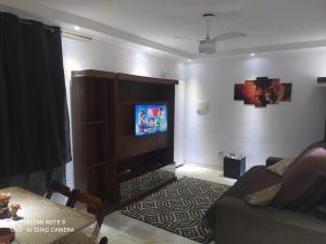 Apartamento no 1º andar perto de belas praias, novo shopping