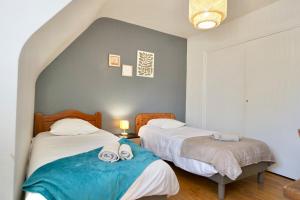 Appartements La maison de la rade - 200m de la plage : photos des chambres