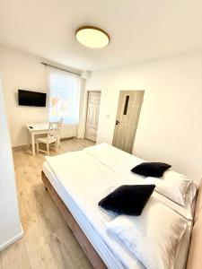 Apartamenty & Pokoje przy PLAŻY