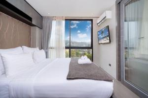 Tropics Kamala Hill View Suite CTG P610 near Beach and Fantasea