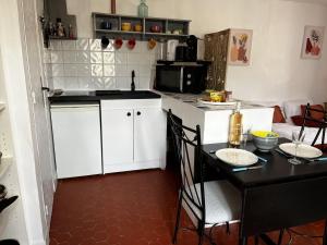 Appartements Au coeur du village provencal : photos des chambres