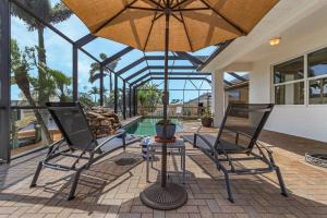 Heated Pool & Spa, Gulf Access, Dock and Tiki Hut - Coastal Escape - Roelens Vacations