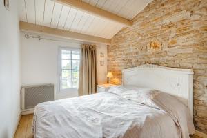 Maisons de vacances Maison Cosy dans Un Domaine : photos des chambres