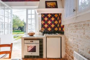 Maisons de vacances Maison Cosy dans Un Domaine : photos des chambres