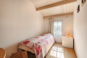 Maisons de vacances Maison Cosy dans Un Domaine : photos des chambres