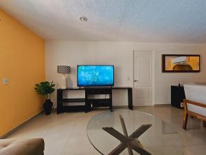 Diamante Lakes Condominium, in front of Arena GNP