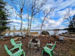 Cabin and Canvas Lakefront Retreat family beach 1dog fire pit
