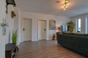 Zuarin Seeblick - Ganzes Apartment direkt am Schlossgarten von Schwerin mit Dschungelfeeling
