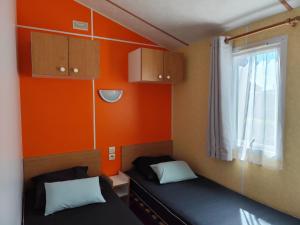 Campings Cosy Lili - Mobilhome RESPIRO - Pleine nature, plage a 250mn : photos des chambres